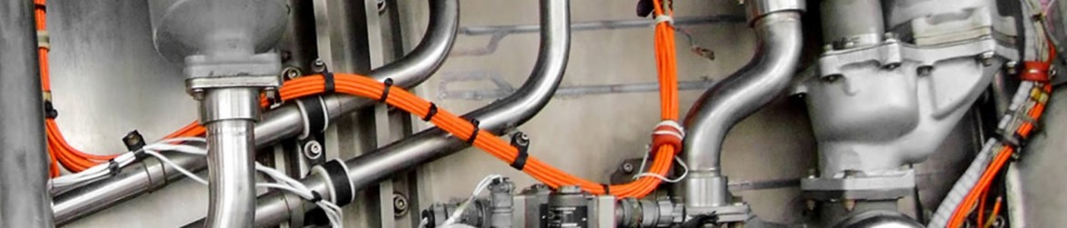 A bunch of wires that are hanging from the ceiling.