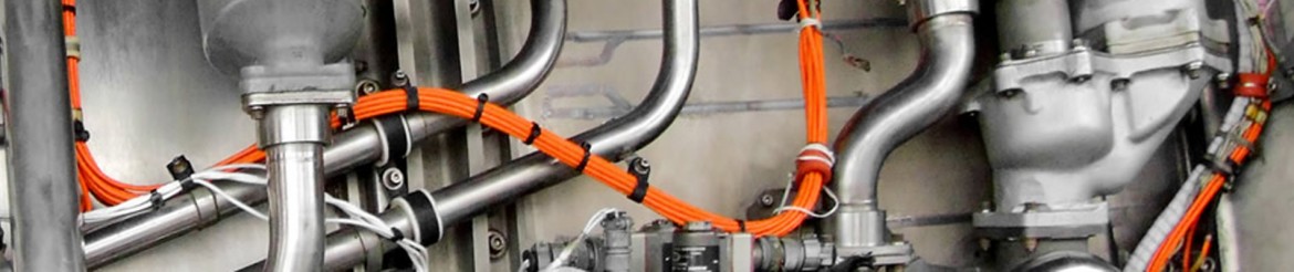 A bunch of wires that are connected to some pipes